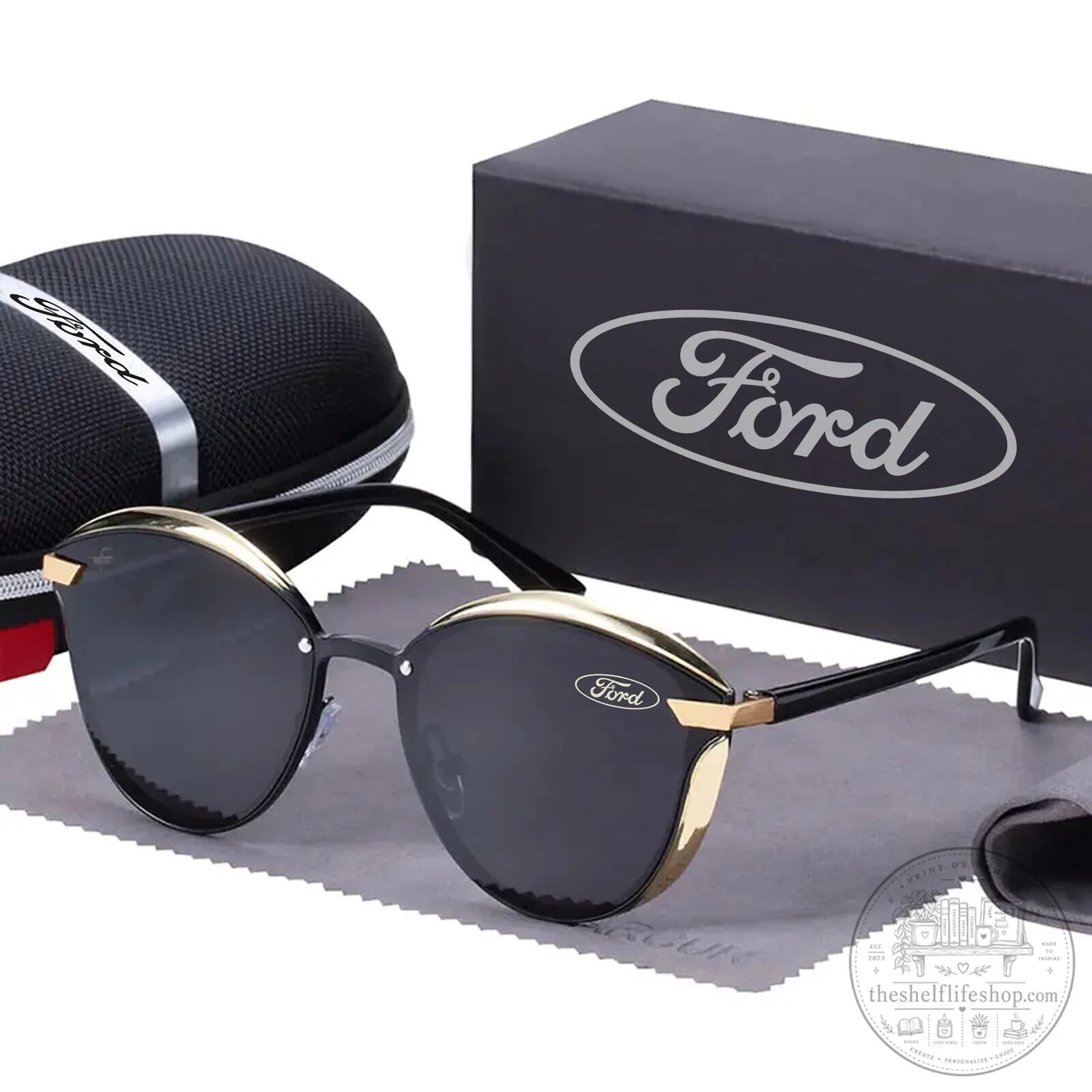 Ford Motor Company Cat Eye Polarized Women's Sunglasses with Gold Trim